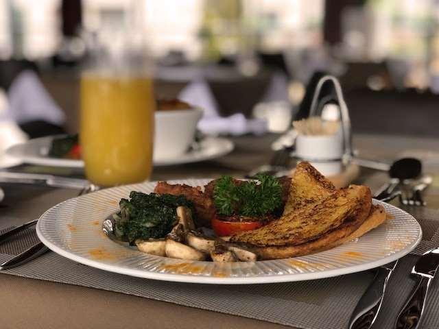 Mythos Boutique Hotel كيغالي المطعم الصورة